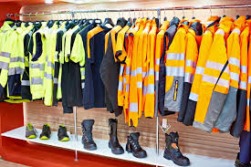 pairs of work boots and a work uniformhung uprepresenting work-related expenses. Tax relief for work expenses