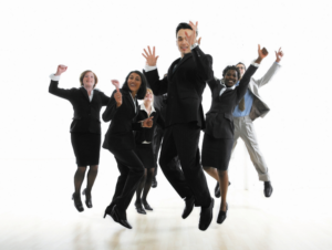 A group of excited friends cheering and smiling together.