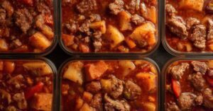 Homemade stew portioned into containers for freezing