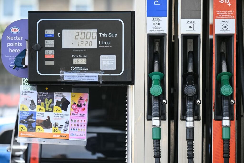 petrol prices rising at UK fuel station showing impact of increasing fuel costs